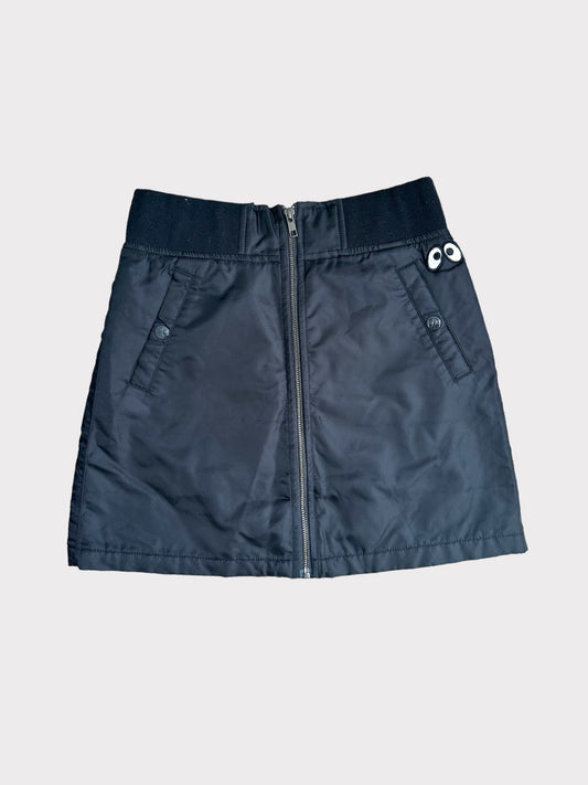 Mini Cream Mini skirt with zipper down front and eye patch